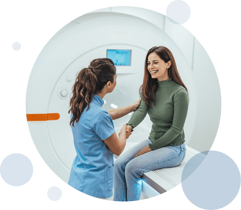 Doctor consulting patient in room.