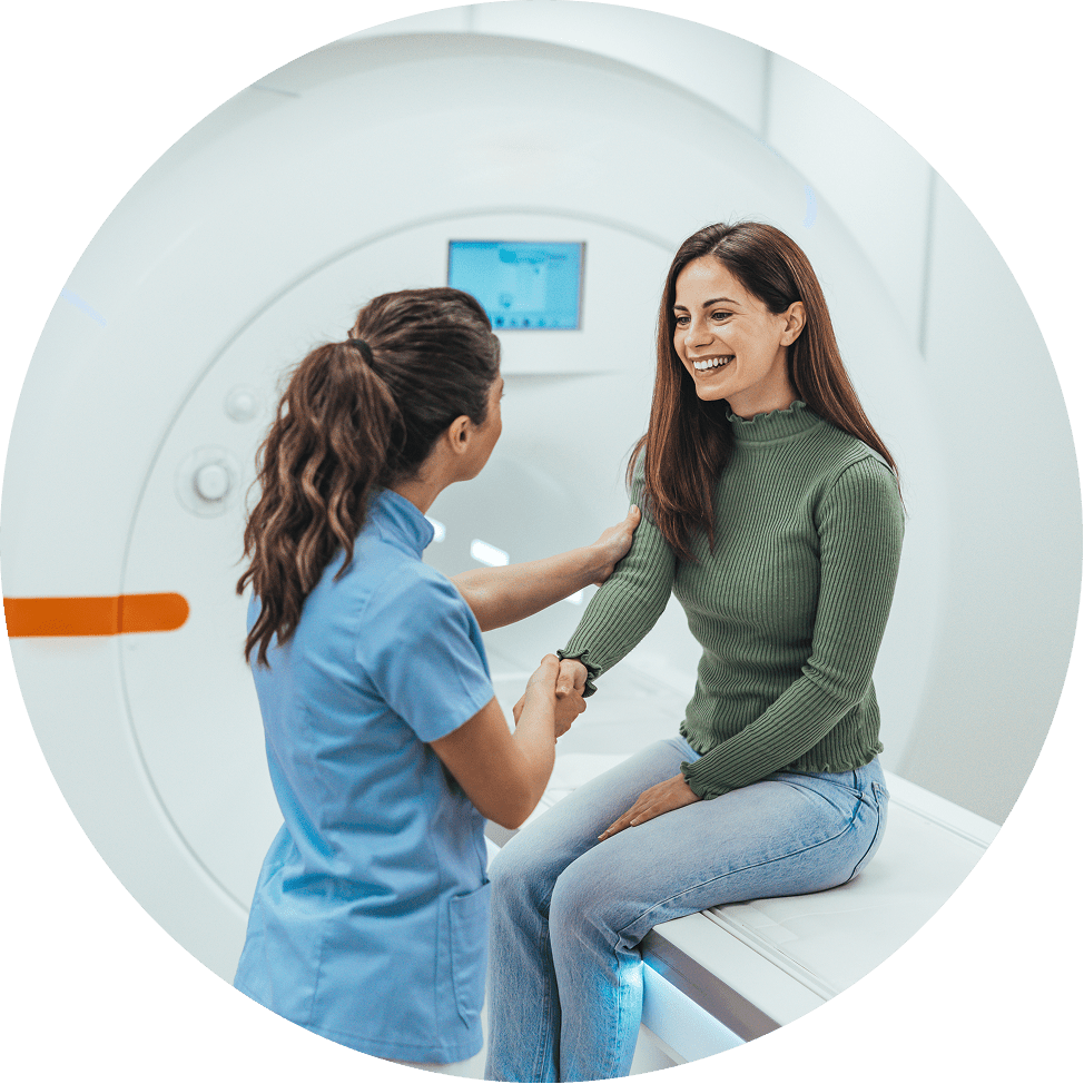 Doctor consulting patient in room.