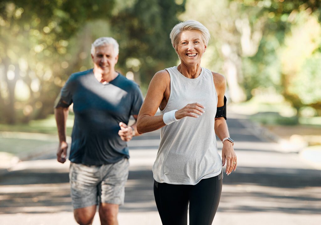 older couple running outside