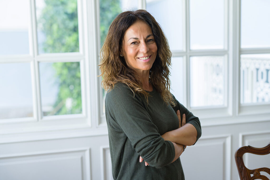 middle aged women smiling at home